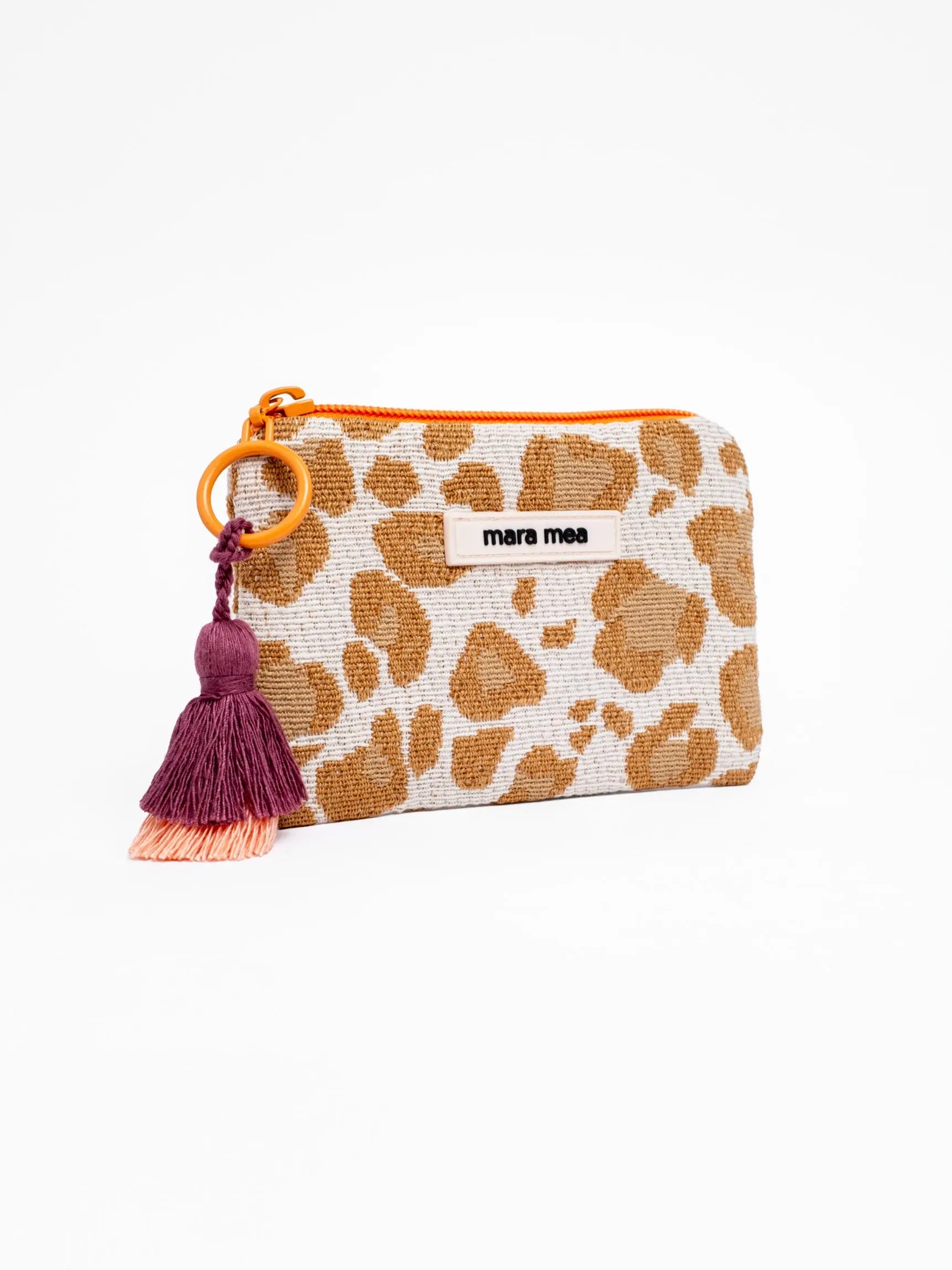 Leo Print Minigeldbeutel in Beige Braun mit orangenem Reißverschlussdetail und zweifarbiger Doppelquaste