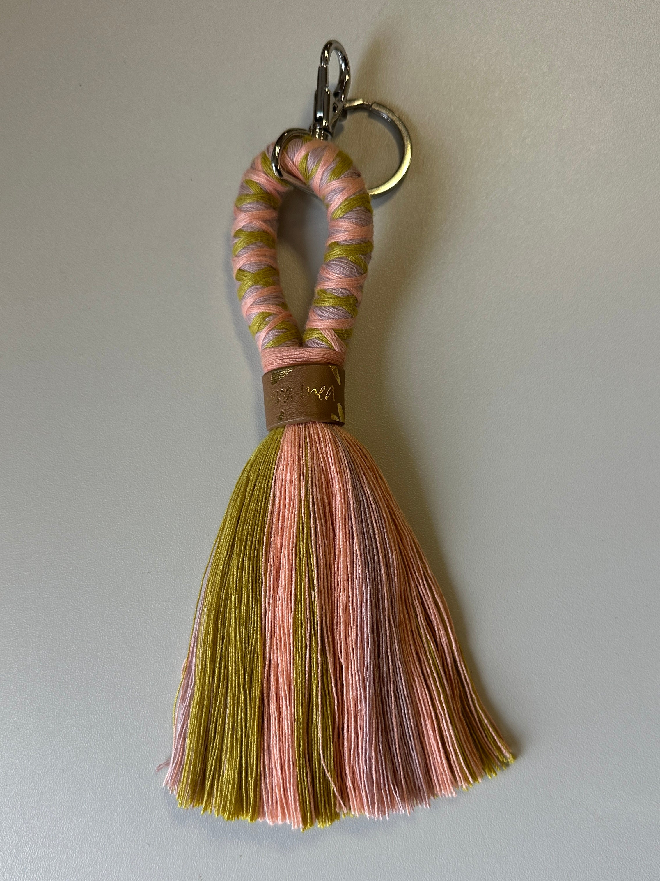 Keyring colour clash in black/white/peach