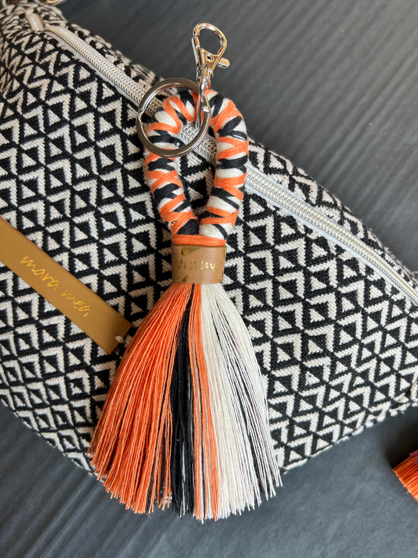 Keyring colour clash in black/white/peach