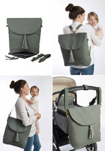 Die Wickeltasche real wanderer in Grün von mara mea kann als Shopper, Rucksack oder am Kinderwagen getragen werden.