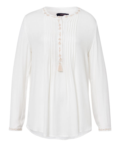 Die Fashion-, Umstands- oder Stillbluse winter ceremony in Off-White von mara mea kommt mit zarter cremefarbiger Stickerei und gleichfarbiger Quaste.