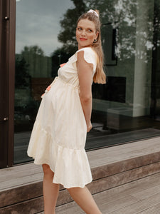Das festliche Umstandskleid white blossom in creme ist ein tolles festliches Umstandskleid für den Sommer